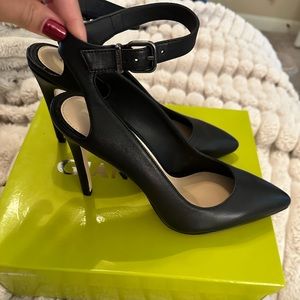 New never worn black leather heels